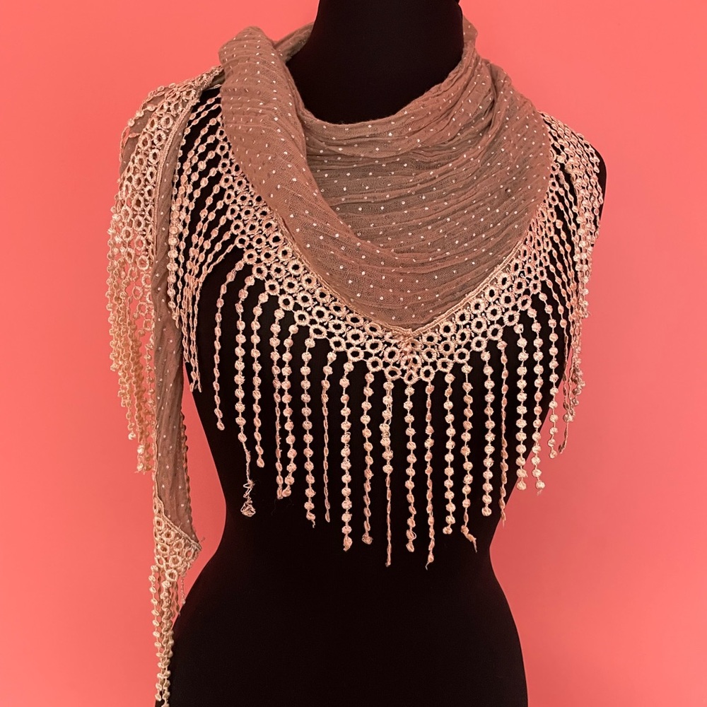Taupe colored fringe scarf. Looks good both ways. Crinkle viscose fabric. Soft.